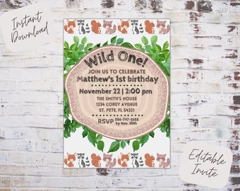 May include: A woodland-themed first birthday party invitation with a woodgrain background and green leaves. The text reads "Wild One!" and includes the child's name, date, time, and RSVP information.