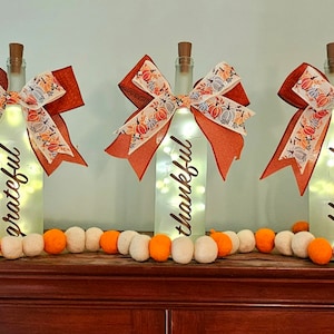 Frosted Thankful greatful blessed wine bottles with beautiful bow and battery powered cork lights. Corked wine bottle. Thanksgiving | Fall