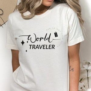 World Traveler Premium Quality T-Shirt, Adventure Seeker Tee, Perfect Gift for Globetrotters & Travel Enthusiasts image 1