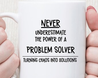 Never Underestimate the Power of a Problem Solver Mug | Turning Chaos Into Solutions | Motivational Office Gift