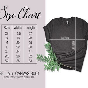 May include: Size chart for a unisex jersey short sleeve tee, showing measurements in inches for width and length for sizes XS, S, M, L, XL, 2XL, and 3XL. The chart is printed on a white background with black text. The image also shows a dark gray t-shirt with the words "WIDTH" and "LENGTH" printed on it.