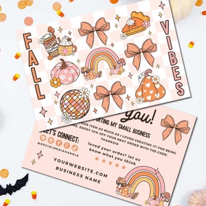 May include: Pink and orange thank you card with a checkered background. The card features fall-themed illustrations, including pumpkins, rainbows, and coffee cups. The text on the card reads "Fall Vibes You!" and "Supporting My Small Business".