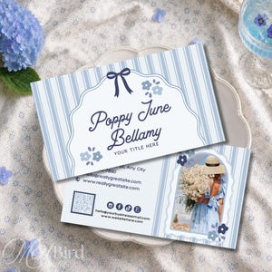 May include: Two rectangular business cards with a light blue and white vertical striped pattern. The top card features a scalloped frame, a dark blue bow, and the text Poppy June Bellamy. The bottom card includes a photo of a person in a blue dress.