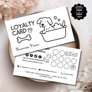 May include: Two white loyalty cards with black text and illustrations. One card features a dog in a bathtub, a paw print, and a bone. The other card has spaces for stamps and a dog illustration. Text includes "Loyalty Card" and "Business Name".