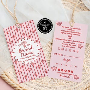May include: Pink and red hang tag with a butterfly pattern. The tag has a white circle with the text "Brand Name" and the text "Your Tagline Here" and "www.website.com". The back of the tag has instructions for washing and sizing information.