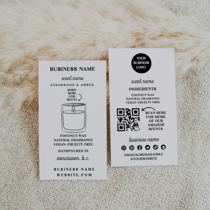 May include: Two black and white labels for a candle business. The left label features a candle illustration and the text "BUSINESS NAME scent name CEDARWOOD & AMBER SNIFF HERE FOR SCENT COCONUT WAX NATURAL FRAGRANCE VEGAN-CRUELTY FREE HANDPOURED IN vancouver. b.c. BUSINESS NAME WEBSITE.COM". The right label features a QR code, the text "YOUR BUSINESS LOGO scent name INGREDIENTS COCONUT WAX NATURAL FRAGRANCE VEGAN-CRUELTY FREE SCAN HERE FOR MORE OF OUR AMAZING SCENTS business name @SOCIALMEDIAHANDLE @YOURWEBSITE".