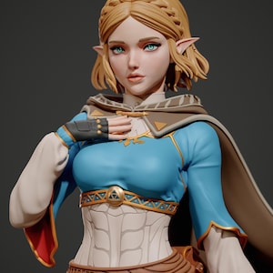 May include: A detailed figurine of a blonde elf-like character with pointed ears and green eyes. The figure wears a blue tunic with gold trim, a white bodice, a brown cape, and fingerless gloves. A gold triangular emblem is centered on the waist.