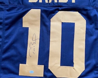 Tom Brady autografió la camiseta de los Michigan Wolverines con COA