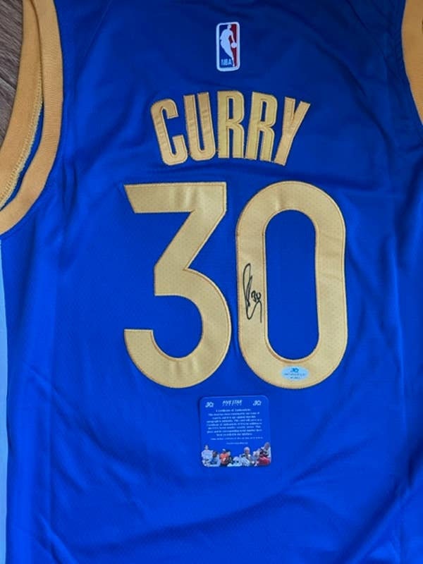 Stephen Curry Signed Warriors 33x42 Custom Framed Jersey Display