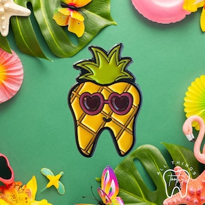 Dental themed Pineapple with Sunglasses tooth shaped enamel pin. Showcase this unique pin for your love for all things dental and Summer.