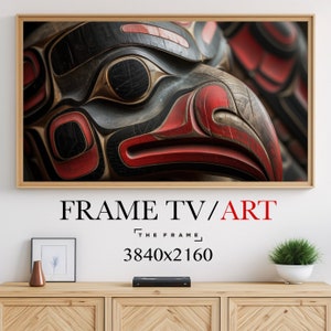 May include: A close-up of a carved wooden mask with red, black, and brown paint. The mask is a traditional design with geometric shapes and a bird-like face.