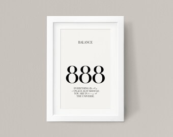 May include: A white framed print with black text that reads "BALANCE 888 EVERYTHING IS IN PLACE AS IT SHOULD. YOU ARE IN THE UNIVERSE."