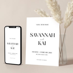 May include: A white save the date card with black text. The card reads "Save Our Date" and features the names "Savannah and Kai" with the date "Fourth February 2021" and the location "Hunter Valley NSW".