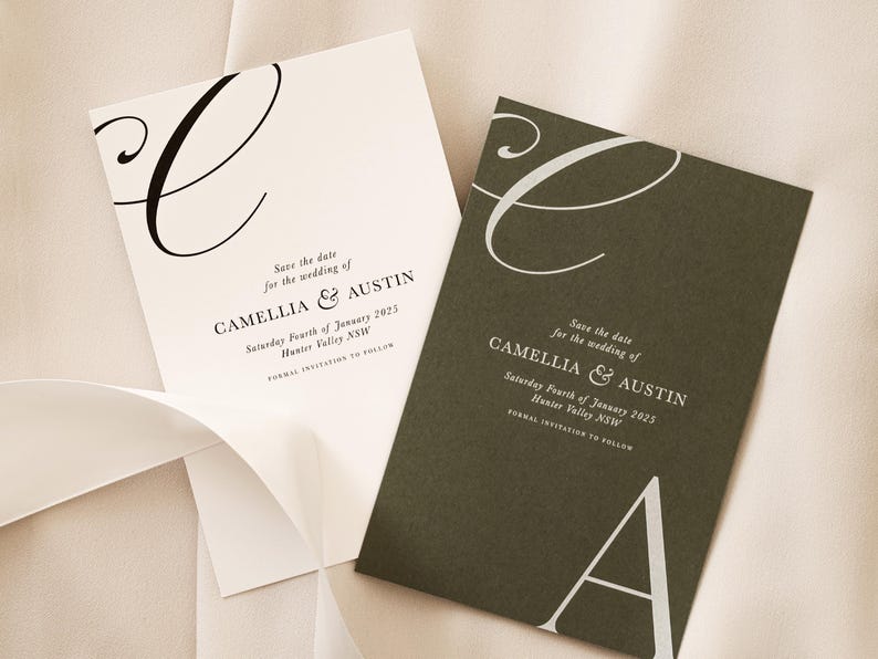 May include: Save the date cards for a wedding. The cards are white and green with black and white calligraphy. The text on the cards reads "Save the date for the wedding of Camelia & Austin. Saturday Fourth of January 2023. Hunter Valley NSW. Formal invitation to follow."