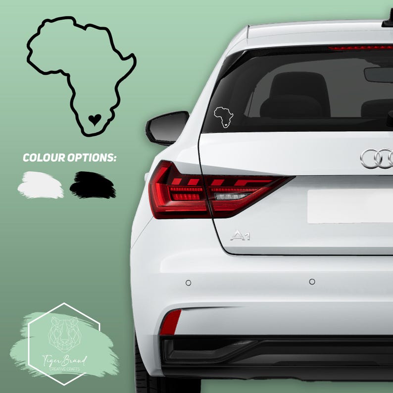 May include: A white car with a black outline of the continent of Africa with a heart in the middle on the back window. The car has a black bumper and black taillights. The text "COLOUR OPTIONS:" is displayed above two swatches of color, one white and one black.