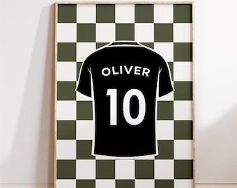 May include: A rectangular wall art print featuring a black sports jersey graphic with the name OLIVER and the number 10 in white text. The jersey is centered against a background of alternating dark olive green and white checkered squares.