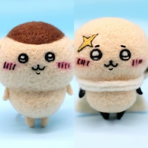 Könnte beinhalten: Zwei Filztier-Plüschtiere mit niedlichen Comic-Gesichtern. Ein Plüschtier ist braun und weiß mit einem braunen Kopf und das andere ist weiß mit einem gelben Stern auf dem Kopf.