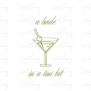 Può includere: Un disegno a linea verde di un bicchiere da martini con un'oliva su uno stecco. Il testo "a bride in a tini bit" è scritto sotto il bicchiere.
