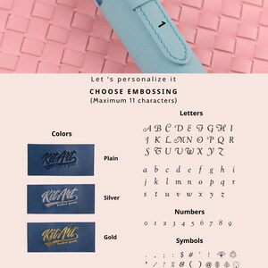 May include: A light blue leather keychain case with a metal ring and the number 1 embossed on the front. The image includes a personalization guide showing options for plain, silver, or gold embossing, along with letters, numbers, and symbols.