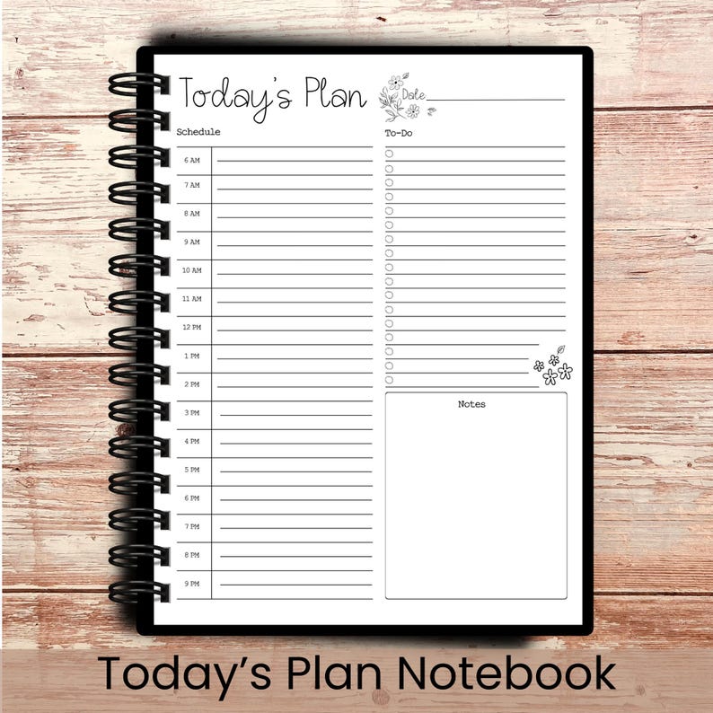May include: A black spiral-bound notebook with a white interior. The notebook is labeled "Today's Plan" and includes sections for scheduling, to-do lists, and notes. The bottom of the notebook reads "Today's Plan Notebook".