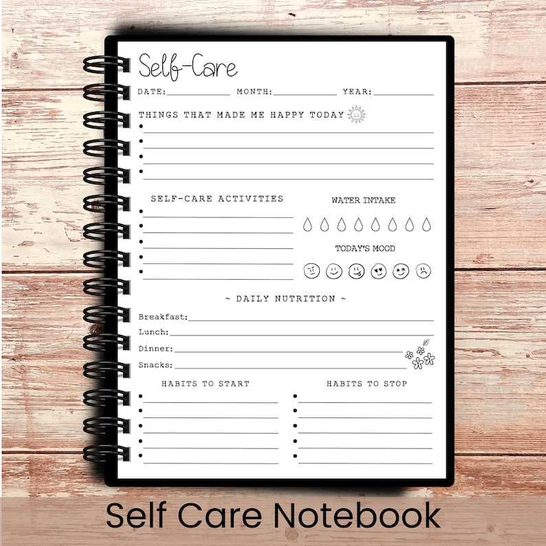 May include: A black spiral-bound notebook with the words "Self-Care" at the top. The notebook's pages include sections for daily entries, including mood tracking, water intake, and habits to start and stop. The words "Self Care Notebook" are at the bottom.