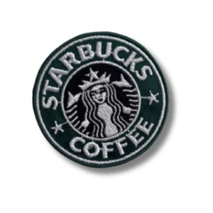 May include: A green and white embroidered patch with the Starbucks logo and the text "Starbucks Coffee".