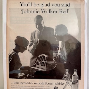 May include: Vintage advertisement for Johnnie Walker Red Label Scotch whisky. The black and white image shows three people enjoying drinks, with the text "You'll be glad you said 'Johnnie Walker Red'". A bottle and a drawing of a man are also featured.