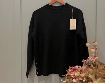Black Ladies Jumper with Button Side Detailing. Stunning jumper with buttons on the side, One size fits most, Long Sleeved.