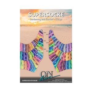 May include: A pair of multi-coloured striped socks with the text "SUPERSOCKE" and "SUNSET - COLOR". The socks feature a vibrant mix of colours including purple, orange, green, and blue. The background shows a beach scene with a sunset.