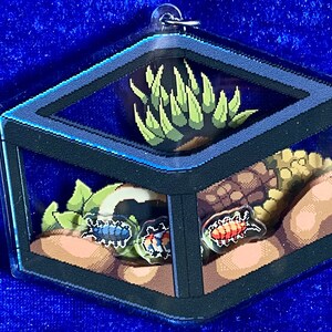 Party mix Isopod Enclosure Pixel Shaker Charm