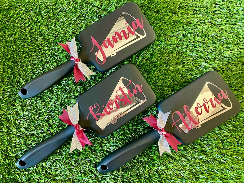 Perfect for competitions, practices, or everyday grooming, our custom cheer team brushes are the ultimate expression of team pride.