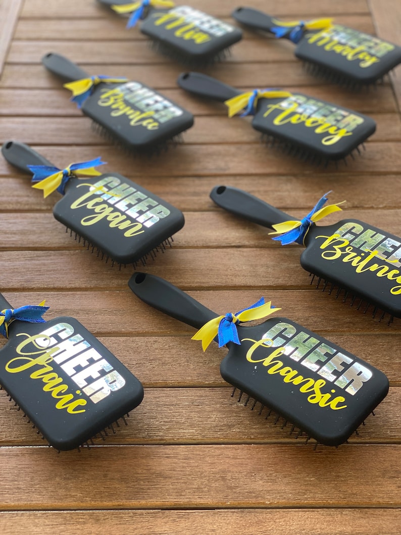 Perfect for competitions, pep rallies, or everyday use, our custom cheer team brushes are the ultimate expression of unity and pride.
