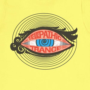 May include: Yellow t-shirt with a black and white graphic of an eye with a blue spiral inside. The eye is surrounded by concentric circles and the text "Telepathic Trance" is written in red letters.