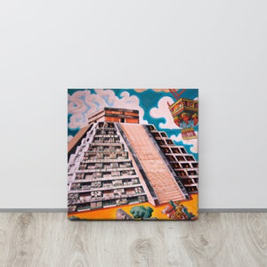May include: A canvas print featuring a colorful illustration of the Mayan pyramid, El Castillo, with a vibrant sky and decorative elements. The artwork showcases the pyramid's detailed architecture and a festive, stylized aesthetic.