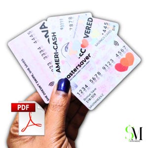 May include: A hand holding three white cards with various designs and text. The cards include the words "AMERI-CASH", "mastersaver", and "SAVINGS CARD". One card has the text "SHE DOESN'T SWIPE, SHE SAVES".
