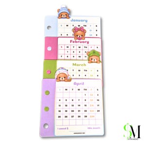May include: A set of four stacked planner calendar inserts for January, February, March, and April. Each page features a grid with days of the week, colorful bear illustrations, and a section at the bottom labeled I saved $ this month.