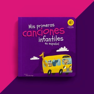 May include: A children's book titled "Mis primeras canciones infantiles en español" with a purple cover. A yellow school bus with animal passengers is featured on the cover. The book has a button that says "Presiona y canta conmigo".