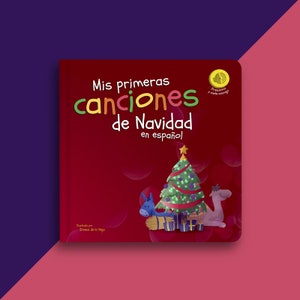 May include: A red book cover with the title "Mis Primeras Canciones de Navidad en español" and an illustration of a donkey and a camel carrying a Christmas tree with presents.