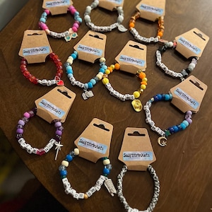 Pulseras de la amistad de álbumes y épocas de T.S. - All Eleven