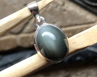 Ciondolo regolabile in argento sterling 925 con occhio di gatto blu