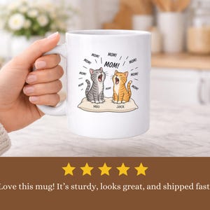 Mug with two cartoon cats, "Milo" and "Jack," calling "MOM!"