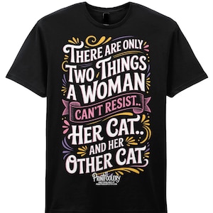 A black t-shirt featuring colourful graphic text that reads There are only two things a woman can't resist.. her cat.. and her other cat.