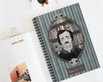 May include: A blue and green spiral notebook with a portrait of Edgar Allan Poe in a frame surrounded by books and cobwebs. The text "Edgar Allan Poe" is printed at the bottom of the notebook.