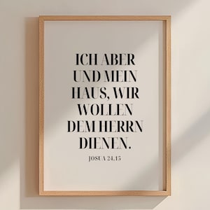 Könnte beinhalten: Ein gerahmter Druck mit dem deutschen Text "ICH ABER UND MEIN HAUS, WIR WOLLEN DEM HERRN DIENEN." in schwarzer Schrift auf weißem Hintergrund. Der Rahmen ist aus hellem Holz. Der Text stammt aus Josu 24,15.