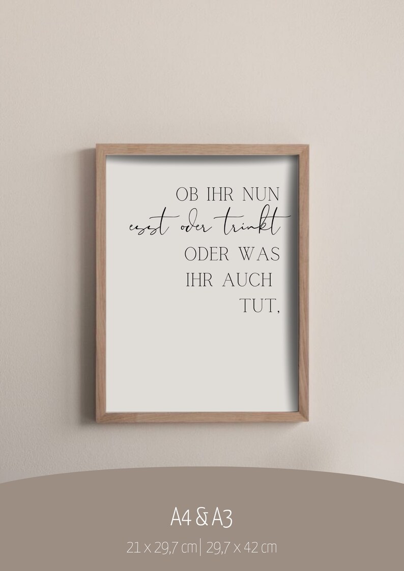May include: A framed print with a white background and black text that reads "OB IHR NUN esst oder trinkt ODER WAS IHR AUCH TUT." The print is in a wooden frame and is available in A4 (21 x 29.7 cm) and A3 (29.7 x 42 cm) sizes.