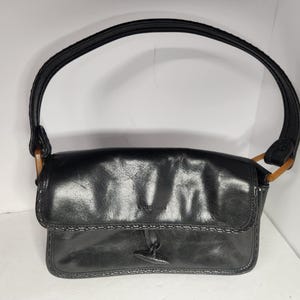 Bolso de mano estilo bohemio Cole Haan de piel negra estilo vintage