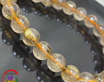 Gold Rutilated Quartz Crystal Bracelet: 8mm Elastic Stretch