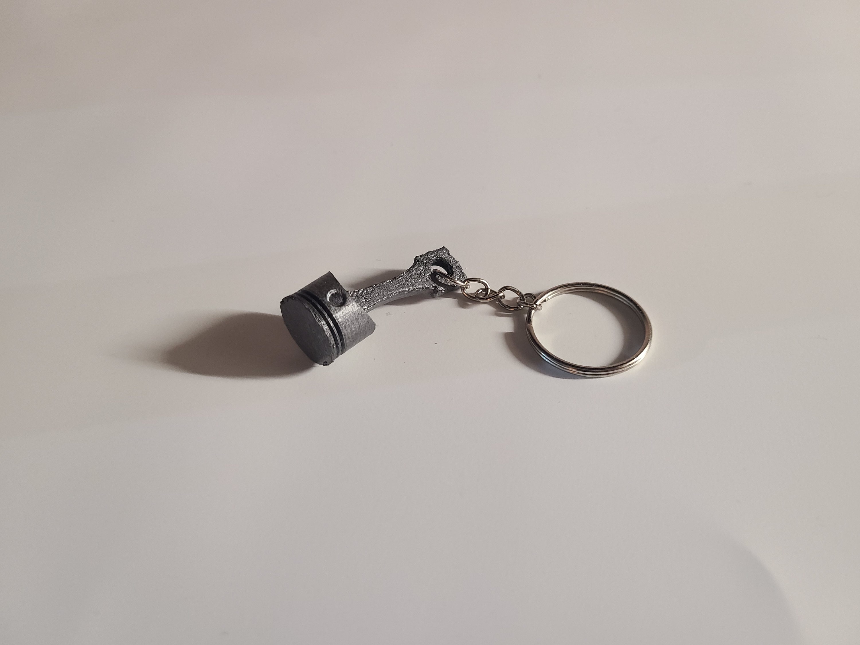 LIUL Piston Art Keychain, Keychain Made from Motorcycle Piston, Skeleton  Engine Model Keyring, Alloy Key Chain Ring, Mini Pendant, Flashlight &  Bottle