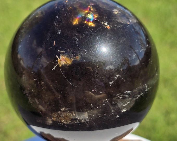 Dark Smokey Quartz with a spot of Gold Rutile Crystal Sphere