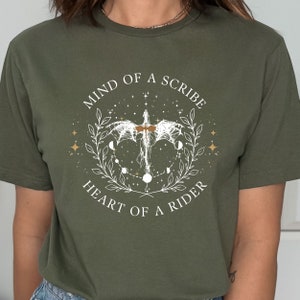 dragon rider shirt, Fourth Wing Mind of a Scribe, Heart of a Rider dragon shirt. Perfect for dragon riders and fantasy book enthusiasts, this Gildan 64000 tee combines comfort with the mythical allure of dragons. Ideal for dragon and fantasy readers.